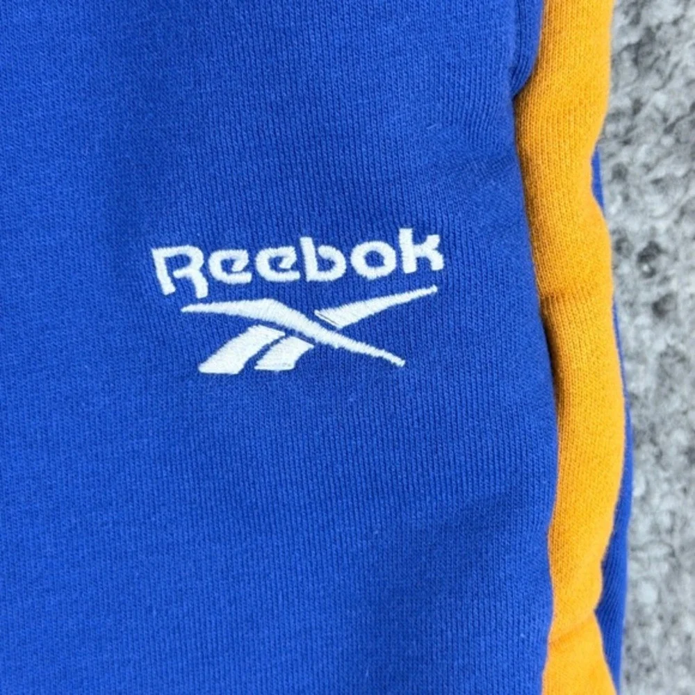 Reebok Forever 21 Mens XL Blue Yellow Snap Button Tear Away Track Pants Joggers